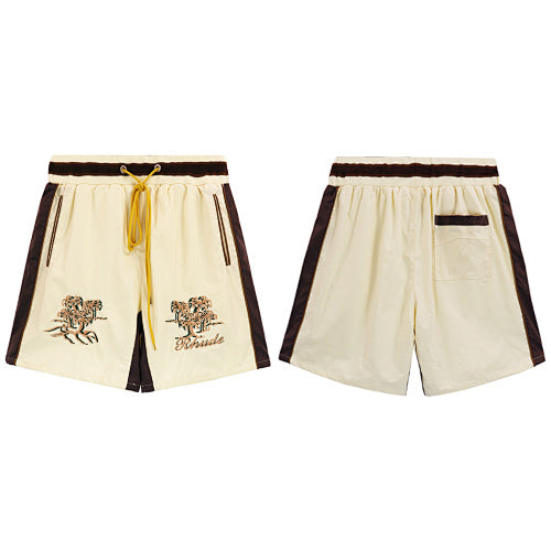 Rhude Cream Embroidered Nylon Shorts Hover Image