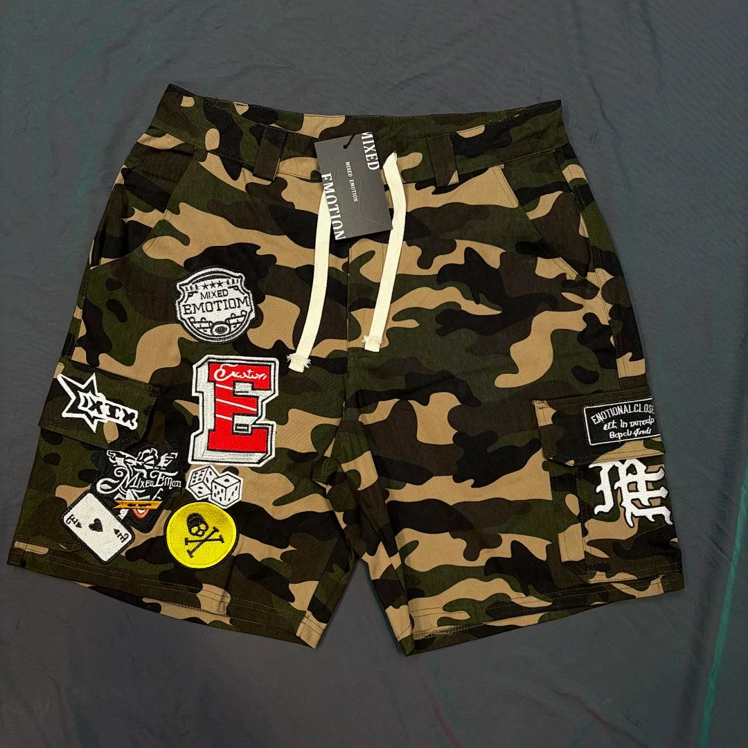 Mixed Emotion Camo Multi‑Patch Cargo Shorts