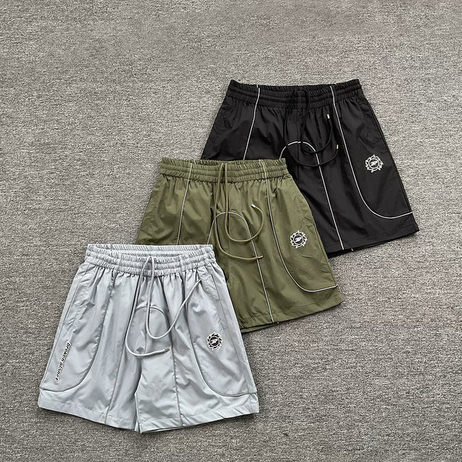 Broken Planet Reflective Piping Nylon Shorts - 3 Colors Available Hover Image